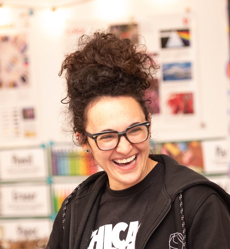 artist Sam Kirk laughs in workshop at bateman elementary school with ipaintmymind