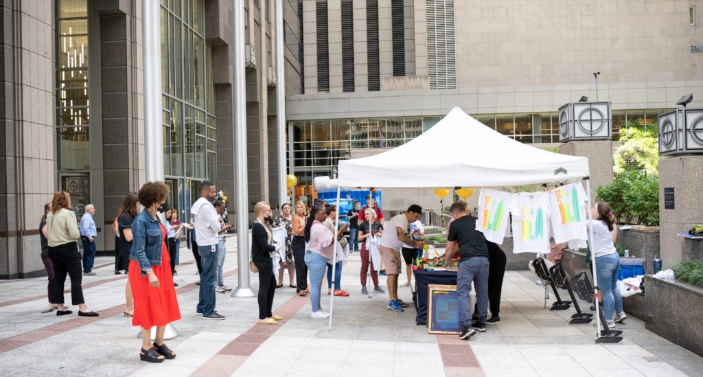wide shot of tented corporate printing event by ipaintmymind