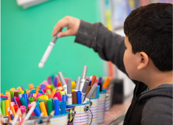kid puts back marker, short banner version